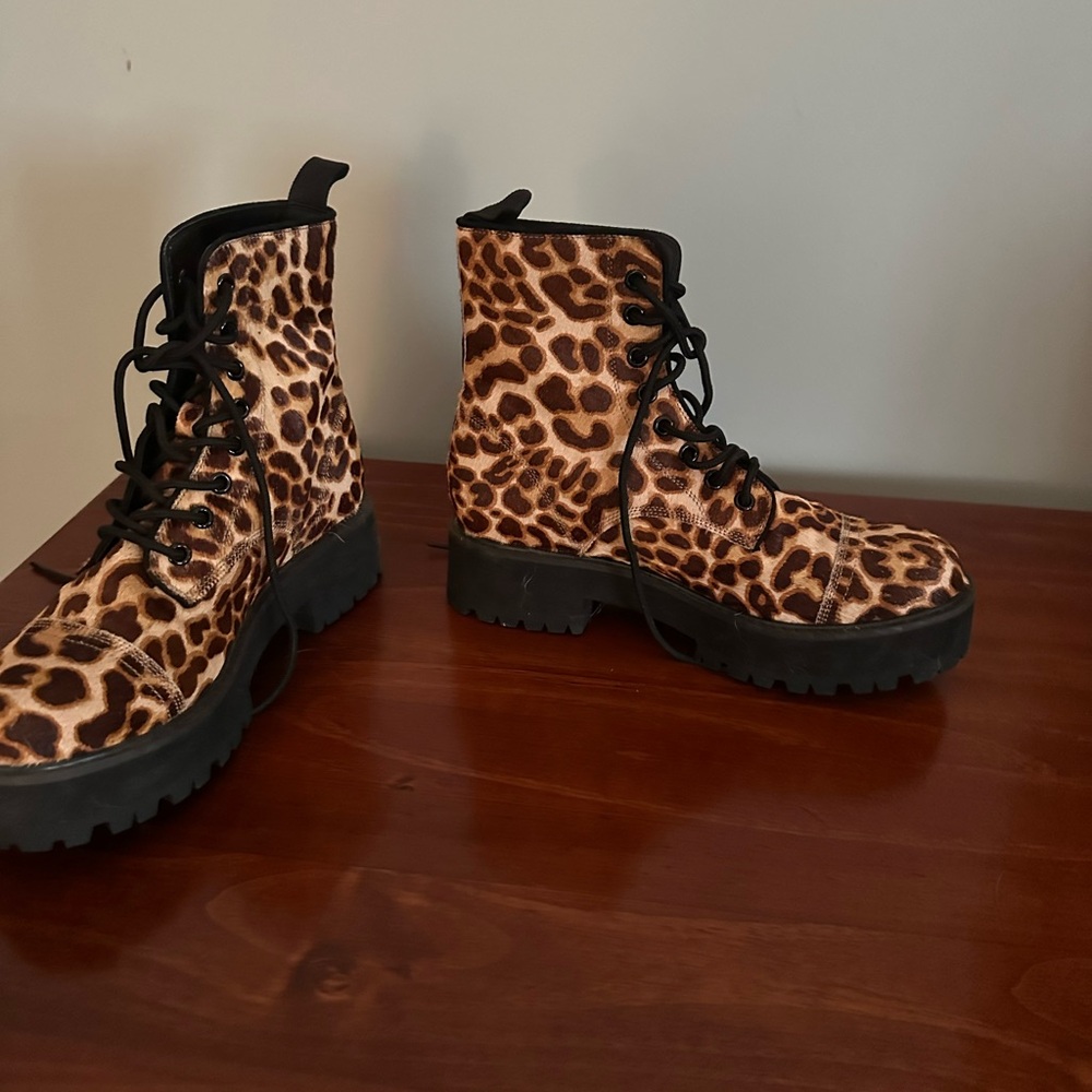 Brand new never worn animal pattern short boots.